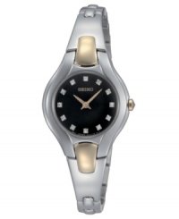 Everyday elegance, updated. This sleek watch from Seiko features a silvertone stainless steel bangle bracelet with goldtone accents. Stainless steel round case. Round black dial with logo and diamond accent indices. Quartz movement. Water resistant to 30 meters. Three-year limited warranty. Everyday elegance, updated. This sleek watch from Seiko features a silvertone stainless steel bangle bracelet with goldtone accents. Stainless steel round case. Round black dial with logo and diamond accent indices. Quartz movement. Water resistant to 30 meters. Three-year limited warranty.