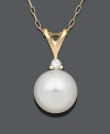 Perfection in the form of a timeless classic. A single cultured freshwater pearl (8-9 mm) with a sparkling diamond accent at the bail looks pristine suspended from a delicate 14k gold setting. Approximate length: 18 inches. Approximate drop: 1/2 inch.