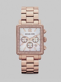 Show your true sparkle in this warm, technical timepiece with a crystal bezel. Quartz movementWater resistant to 5 ATMRectangular rose goldtone stainless steel case, 35mm (1.3) X 32mm (1.2)Crystal bezelMother-of-pearl chronograph dialNumeric and bar hour markersDate display between 4 and 5 o'clockSecond hand Rose goldtone stainless steel link braceletImported Show your true sparkle in this warm, technical timepiece with a crystal bezel. Quartz movementWater resistant to 5 ATMRectangular rose goldtone stainless steel case, 35mm (1.3) X 32mm (1.2)Crystal bezelMother-of-pearl chronograph dialNumeric and bar hour markersDate display between 4 and 5 o'clockSecond hand Rose goldtone stainless steel link braceletImported