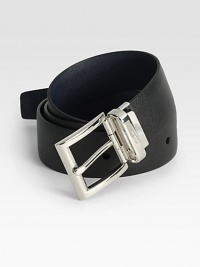 Textured saffiano leather that reverses from black on one side to navy on the other, completed with a logo engraved metal buckle.LeatherAbout 1¼ wideMade in Italy Textured saffiano leather that reverses from black on one side to navy on the other, completed with a logo engraved metal buckle.LeatherAbout 1¼ wideMade in Italy