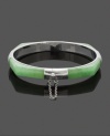 Slip effortless style and brilliant color over your wrist. Bright green jade bangle (7 mm x 35 mm) combines with polished sterling silver for a look that's stylish and adds a touch of uniqueness. Approximate diameter: 2-1/2 inches.