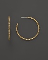 14K. yellow gold beads add fascinating texture and brilliance to classic hoops. By Lana.