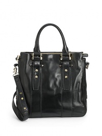 THE LOOKDouble top handlesRemovable, adjustable leather crossbody strapTop zip closureScrew head accentsProtective metal feetTwo inside open pocketsOne inside zip pocketTHE MEASUREMENTDouble top handles, 5½Crossbody strap, 15-20 drop12½W X 11½H X 5DTHE MATERIALLeatherFully linedORIGINImported THE LOOKDouble top handlesRemovable, adjustable leather crossbody strapTop zip closureScrew head accentsProtective metal feetTwo inside open pocketsOne inside zip pocketTHE MEASUREMENTDouble top handles, 5½Crossbody strap, 15-20 drop12½W X 11½H X 5DTHE MATERIALLeatherFully linedORIGINImported