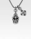 A wholly original and utterly fashionable look in braided sterling silver with a weighty skull accent, and another cross charm studded with 18K gold. From the UnKaged Collection Skull, 1H Cross, ¾H Endless chain, 26 long Made in USA