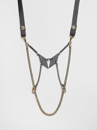 A truly unique geometric style that features black powder coated brass stampings and vintage snake chains on a leather strap. Leatherblack powder coated brassVintage chainLength, about 16Lobster claspMade in USA A truly unique geometric style that features black powder coated brass stampings and vintage snake chains on a leather strap. Leatherblack powder coated brassVintage chainLength, about 16Lobster claspMade in USA