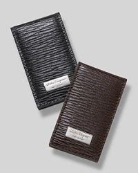 Salvatore Ferragamo revival magnetic money clip. Textured leather money clip with silver Ferragamo engraved on front buckle. Features magnetic closure. Salvatore Ferragamo revival magnetic money clip. Textured leather money clip with silver Ferragamo engraved on front buckle. Features magnetic closure.