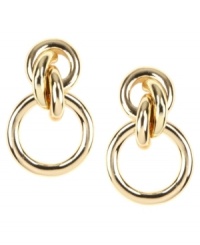 Valley Girl chic. AK Anne Klein revives a vintage doorknocker design with a modern twist with knot detail. Crafted in gold tone mixed metal. Approximate drop: 1 inch. Valley Girl chic. AK Anne Klein revives a vintage doorknocker design with a modern twist with knot detail. Crafted in gold tone mixed metal. Approximate drop: 1 inch.