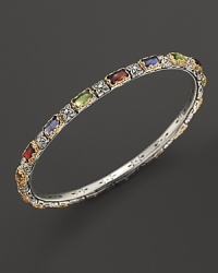Colorful gemstones embellish this etched sterling silver and 18K gold bangle from Konstantino. Colorful gemstones embellish this etched sterling silver and 18K gold bangle from Konstantino.