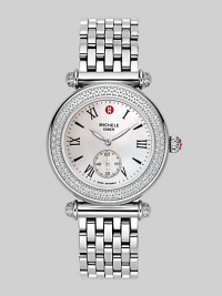 From the Caber Collection. A timepiece both graceful and sophisticated, in polished stainless steel with a diamond bezel and mother-of-pearl dial. Swiss quartz movement Water-resistant to 5 ATM Diamond bezel, 0.58 tcw Slightly oval case; 46mm X 37mm (1.81 X 1.46) Sapphire crystal Mother-of-pearl dial Roman numerals Second hand sub-dial at 6 o'clock Link bracelet; width 18mm (.71) Imported