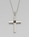 A polished cross pendant is suspended from a chain necklace, both crafted in sterling silver.From the Bedeg CollectionSterling silverPendant, 1¼W x 1½HNecklace, 24 lengthImported