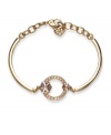 Brilliant and beautiful. Adorned with sparkling Moonlight and Golden Shadow crystals, Swarovski's geometric bangle bracelet will command attention whenever you wear it. Crafted in gold tone mixed metal. Approximate diameter: 2-3/8 inches.