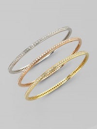 A slim-lined bracelet in 18k rose gold, set all around with a ring of sparkling diamonds. Diamonds, 2.07 tcw 18k rose gold Diameter, about 2¾ Made in Italy A slim-lined bracelet in 18k rose gold, set all around with a ring of sparkling diamonds. Diamonds, 2.07 tcw 18k rose gold Diameter, about 2¾ Made in Italy