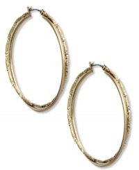 Fashion with a twist. Jones New York's double hoop earrings lend vintage appeal. Crafted of worn gold tone mixed metal. Approximate diameter: 1 inch. Fashion with a twist. Jones New York's double hoop earrings lend vintage appeal. Crafted of worn gold tone mixed metal. Approximate diameter: 1 inch.