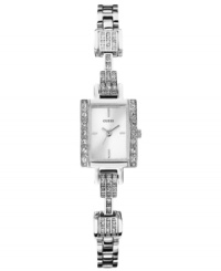 Dazzling details blend within a splendid design in this darling GUESS timepiece. Dazzling details blend within a splendid design in this darling GUESS timepiece.