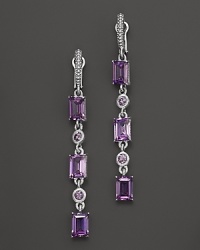 Sparkling purple crystals showcase brilliant color on Judith Ripka's triple baguette earrings. Sparkling purple crystals showcase brilliant color on Judith Ripka's triple baguette earrings.
