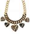Wild at heart. This frontal necklace from Betsey Johnson is crafted from gold-tone mixed metal with with glass crystal and leopard print adorning black heart stones for a bit of animal attraction. Approximate length: 15 inches + 3-inch extender. Approximate frontal drop: 2-1/2 inches. Approximate heart drop: 1-3/4 inches.