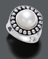 Flawless contemporary design. One lustrous cultured freshwater pearl (10.5-11 mm) rests among a circle of gleaming spheres in this sterling silver ring by Fresh by Honora. Flawless contemporary design. One lustrous cultured freshwater pearl (10.5-11 mm) rests among a circle of gleaming spheres in this sterling silver ring by Fresh by Honora.