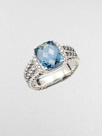 From the Petite Wheaton Collection. A stunning, faceted blue topaz stone flanked by brilliant diamonds on a sterling silver, triple-row shank. Blue topazDiamonds, .1 tcwSterling silverImported From the Petite Wheaton Collection. A stunning, faceted blue topaz stone flanked by brilliant diamonds on a sterling silver, triple-row shank. Blue topazDiamonds, .1 tcwSterling silverImported