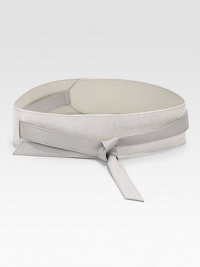 This Asian-inspired style boasts a supple two-tone leather design and a tie closure. Width, about 3Imported This Asian-inspired style boasts a supple two-tone leather design and a tie closure. Width, about 3Imported