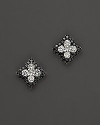 Black and white diamonds sparkle in 14K. white gold settings. Black and white diamonds sparkle in 14K. white gold settings.