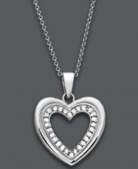Sweet simplicity. Capture her heart with Victoria Townsend's diamond heart pendant. Crafted in sterling silver and decorated by an inner row of round-cut diamonds (1/4 c.t. t.w). Approximate length: 18 inches. Approximate drop: 1 inch. Sweet simplicity. Capture her heart with Victoria Townsend's diamond heart pendant. Crafted in sterling silver and decorated by an inner row of round-cut diamonds (1/4 c.t. t.w). Approximate length: 18 inches. Approximate drop: 1 inch.