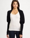 A chic, structured mutton sleeve lends unique style to this lightweight knit shrug.Open frontMutton sleeves with extra long cuffsAbout 10 from shoulder to hem80% rayon/20% nylonDry cleanImported