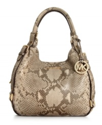 An absolute snake charmer, this posh python-embossed leather tote from MICHAEL Michael Kors is the accessory of the season. Soft leather is adorned with golden buckle and stud accents, while the roomy interior provides three separate compartments to keep you organized on-the-go. An absolute snake charmer, this posh python-embossed leather tote from MICHAEL Michael Kors is the accessory of the season. Soft leather is adorned with golden buckle and stud accents, while the roomy interior provides three separate compartments to keep you organized on-the-go.