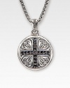 A sterling silver medallion is detailed with deep-relief Sparta engraving and a diamond-cut black sapphire cross. 1.36 tcw Medallion, about 1 dia Endless chain, 26 long Made in USA