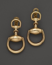 Equestrian-inspired drop earrings in yellow gold from Gucci. Equestrian-inspired drop earrings in yellow gold from Gucci.
