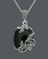 Let elegance unfurl at your neckline. Genevieve & Grace pendant features a scrolling, floral pattern enveloping an onyx cabochon gemstone (17 mm x 15 mm). Crafted in sterling silver with glittering marcasite accents. Approximate length: 18 inches. Approximate drop: 1-1/4 inches.