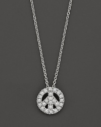 From the Tiny Treasures collection, a diamond peace sign necklace; with signature ruby accent. Designed by Roberto Coin. From the Tiny Treasures collection, a diamond peace sign necklace; with signature ruby accent. Designed by Roberto Coin.