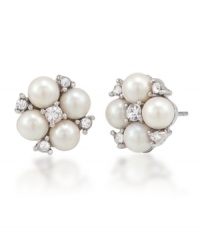 Pearl perfection. Luminous imitation pearls yield timeless elegance for Carolee's small cluster button earrings. Crafted in silver tone mixed metal, they're adorned with sparkling glass accents. Approximate diameter: 1/2 inch. Pearl perfection. Luminous imitation pearls yield timeless elegance for Carolee's small cluster button earrings. Crafted in silver tone mixed metal, they're adorned with sparkling glass accents. Approximate diameter: 1/2 inch.