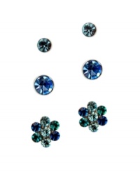 Sparkling style to match any ensemble. GUESS's fashionable three earring stud set features two round-cut studs and one pair of flower studs. Set crafted in silver tone mixed metal highlighting blue and blue zircon crystals. Approximate diameters: 7 mm, 5 mm, and 3-1/2 mm. Sparkling style to match any ensemble. GUESS's fashionable three earring stud set features two round-cut studs and one pair of flower studs. Set crafted in silver tone mixed metal highlighting blue and blue zircon crystals. Approximate diameters: 7 mm, 5 mm, and 3-1/2 mm.