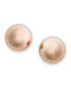 Sleek, polished studs perfect any ensemble. Crafted in 14k rose gold, earrings feature a smooth dome-shaped surface. Approximate diameter: X inch.