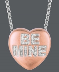 Won't you be my Valentine? Sweethearts' adorable heart-shaped pendant expresses more that just great style with the words BE MINE written in round-cut diamonds (1/8 ct. t.w.) across the surface. Pendant crafted in 14k rose gold over sterling silver and sterling silver. Copyright © 2011 New England Confectionery Company. Approximate length: 16 inches + 2-inch extender. Approximate drop: 5/8 inch. Won't you be my Valentine? Sweethearts' adorable heart-shaped pendant expresses more that just great style with the words BE MINE written in round-cut diamonds (1/8 ct. t.w.) across the surface. Pendant crafted in 14k rose gold over sterling silver and sterling silver. Copyright © 2011 New England Confectionery Company. Approximate length: 16 inches + 2-inch extender. Approximate drop: 5/8 inch.