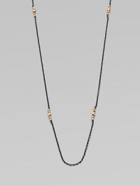 A simply chic design with 14k gold beads clusters on oxidized sterling silver link chain. 14k gold beadsOxidized sterling silverLength, about 40Spring ring closureMade in USA A simply chic design with 14k gold beads clusters on oxidized sterling silver link chain. 14k gold beadsOxidized sterling silverLength, about 40Spring ring closureMade in USA