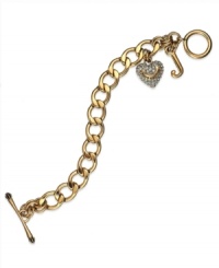 Show your love for Juicy Couture with this toggle bracelet featuring a glass stone embellished heart pendant and J-shaped pendant. Chain crafted in gold tone stainless steel. Charms crafted in gold tone brass. Approximate length: 8 inches. Approximate drop: 3/4 inch. Show your love for Juicy Couture with this toggle bracelet featuring a glass stone embellished heart pendant and J-shaped pendant. Chain crafted in gold tone stainless steel. Charms crafted in gold tone brass. Approximate length: 8 inches. Approximate drop: 3/4 inch.