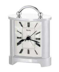 A lustrous dial lends a sophisticated spirit to this tabletop alarm clock by Bulova. Rectangular chrome-finished metal case with handle at top and curved protective lens. Features beep alarm. A lustrous dial lends a sophisticated spirit to this tabletop alarm clock by Bulova. Rectangular chrome-finished metal case with handle at top and curved protective lens. Features beep alarm.