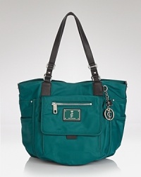 When you are ready to be noticed, grab this roomy tote from Juicy Couture. Durable nylon saturated with color is the perfect focal point for all of your daytime looks. When you are ready to be noticed, grab this roomy tote from Juicy Couture. Durable nylon saturated with color is the perfect focal point for all of your daytime looks.