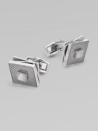 High-polish rhodium-plated metal with a fixed square back, hatched texture and rotating tiers. T backingAbout ½ diam.Plated metalMade in the United Kingdom High-polish rhodium-plated metal with a fixed square back, hatched texture and rotating tiers. T backingAbout ½ diam.Plated metalMade in the United Kingdom