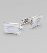 A sophisticated sartorial design in highly polished sterling silver inlaid with stripes of mother-of-pearl detail. T-backing About ½ wide Imported 