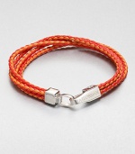 Boldly-hued, braided strands of fine leather are offset by a sterling silver clasp.LeatherSterling silverAbout 2½ diam.Made in the United Kingdom