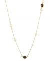 Long and luxurious. This beautiful 42-inch necklace combines petite stations of cultured freshwater pearl (6-8 mm) and onyx (15-3/8 ct. t.w.). Delicate chain and setting crafted in 18k gold over sterling silver. Approximate length: 42 inches.