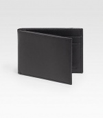 Sleek, slim design rendered in subtly pebbled calfskin leather.One billfold compartmentFour card slotsLeather4½W x3½HImported