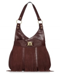 Channel your inner hippie-chic with this '70s-inspired vintage shoulder bag from Etienne Aigner. Crafted in sumptuous leather, far-out fringe adorns the design, while posh golden hardware and signature plaque add updated detail. Channel your inner hippie-chic with this '70s-inspired vintage shoulder bag from Etienne Aigner. Crafted in sumptuous leather, far-out fringe adorns the design, while posh golden hardware and signature plaque add updated detail.