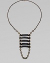 From the Signature Collection. A modern, urban design with an ancient, tribal look, combining hand-stained, antiqued brass links with coated Italian leather.BrassLeatherLength, about 23Double front lobster claspsMade in USA