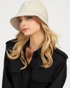 A classic style to keep you dry from the elements. CottonBrim, about 2Dry cleanImported