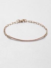 A row of petite ruby stones set in 14k rose gold on a link chain. Ruby14k rose goldLength, about 6.75Lobster clasp closure closureImported A row of petite ruby stones set in 14k rose gold on a link chain. Ruby14k rose goldLength, about 6.75Lobster clasp closure closureImported