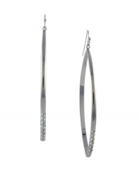 Steal the show. This standout BCBGeneration style takes the traditional hoop earring and glams it up with the addition of sparkling clear glass accents. Crafted in oxidized silver tone mixed metal. Approximate diameter: 3 inches. Steal the show. This standout BCBGeneration style takes the traditional hoop earring and glams it up with the addition of sparkling clear glass accents. Crafted in oxidized silver tone mixed metal. Approximate diameter: 3 inches.