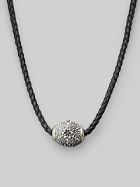 Stunning texture enlivens a gleaming silver pendant strung on braided leather. Sterling silver ¾ X 1 Necklace, about 18 Imported Stunning texture enlivens a gleaming silver pendant strung on braided leather. Sterling silver ¾ X 1 Necklace, about 18 Imported